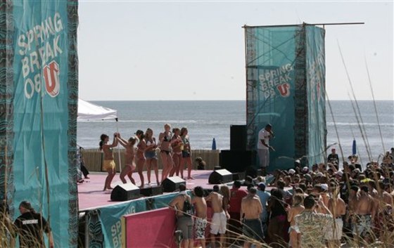 Spring breakers take part in a dance contest during MTV spring break activities in Panama City Beach, Fla.
